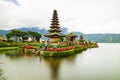 Pura Ulun Danu Bratan temple. Balinese landmark. Water reflection. Slow shutter speed. Bratan lake, Bali, Indonesia Royalty Free Stock Photo