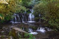 Purakaunui Falls, New Zealand. Slow shutter speed smoothes fall Royalty Free Stock Photo