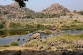 Purandara Mandapa looking towards Chandramouleshwara Temple over Tungabhadra River, Hampi, near Hospete, Karnataka, India Royalty Free Stock Photo