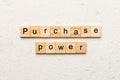 Purchase power word written on wood block. Purchase power text on cement table for your desing, concept Royalty Free Stock Photo