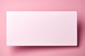 Pure backdrop: Blank white card isolated on pastel pink, ready for your sentiments.