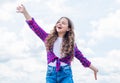 Pure beauty. concept of future. happy childhood. cheerful teen girl has long curly hair. kid smiling outdoor. kid Royalty Free Stock Photo