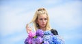 Pure beauty. Tenderness of young skin. Springtime bloom. Beauty of spring season. Girl tender blonde hold hydrangea Royalty Free Stock Photo