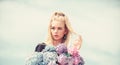 Pure beauty. Tenderness of young skin. Springtime bloom. Beauty of spring season. Girl tender blonde hold hydrangea Royalty Free Stock Photo