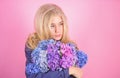 Pure beauty. Tenderness of young skin. Springtime bloom. Simple beauty. Girl cute blonde hug hydrangea flowers bouquet Royalty Free Stock Photo