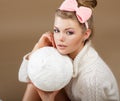 Pure Beauty. Woman in White Fluffy Knitted Pullover with Hank of Thread Royalty Free Stock Photo