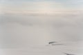 Pure cloud on the high mountain peak on winter day