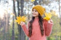 Pure feelings. child walk in autumn forest. warm clothes fashion. seasonal weather. childhood happiness. beauty of fall Royalty Free Stock Photo