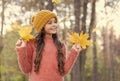 Pure feelings. child walk in autumn forest. warm clothes fashion. seasonal weather. childhood happiness. beauty of fall Royalty Free Stock Photo