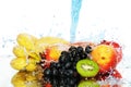 Pure fruit in a spray of water Royalty Free Stock Photo