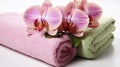 Pure Harmony. Orchid flower and towel rolls, isolated on white. Generative AI Royalty Free Stock Photo