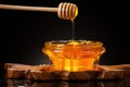 pure honey dripped from a wooden honey dipper Royalty Free Stock Photo