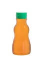 Pure honey in plastic bottle Royalty Free Stock Photo