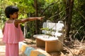 A Little girl pointing Something in the Park, Stock Photo