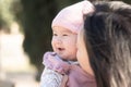 pure joy as a young Asian Chinese mother lovingly plays with her little baby girl, creating a lasting affection happiness bond - Royalty Free Stock Photo