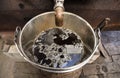 Pure maple syrup freshly poured into a bucket after boiling Royalty Free Stock Photo