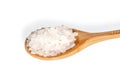 Pure natural rock salt. Large salt crystals in a bamboo spoon. Close up isolated on white background Royalty Free Stock Photo