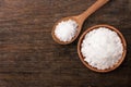 Pure natural sea salt in wooden bowl and spoon Royalty Free Stock Photo