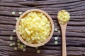 Pure organic yellow beeswax pellets Royalty Free Stock Photo