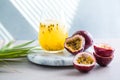 Pure passion, alcoholic cocktail with syrup, lime, orange juice, soda, ice and passion fruit Royalty Free Stock Photo