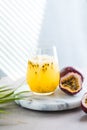 Pure passion, alcoholic cocktail with syrup, lime, orange juice, soda, ice and passion fruit Royalty Free Stock Photo