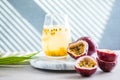 Pure passion, alcoholic cocktail with syrup, lime, orange juice, soda, ice and passion fruit Royalty Free Stock Photo