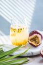 Pure passion, alcoholic cocktail with syrup, lime, orange juice, soda, ice and passion fruit Royalty Free Stock Photo