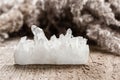 Pure Quartz Crystal Cluster on Wooden Background Royalty Free Stock Photo