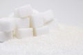 Pure refined sugar and sugar cubes. Sweet food ingredient, the d