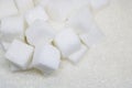 Pure refined sugar and sugar cubes. Sweet food ingredient, the d