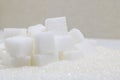 Pure refined sugar and sugar cubes. Sweet food ingredient, the d