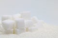 Pure refined sugar and sugar cubes. Sweet food ingredient, the d