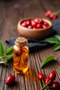 Pure rosehip seed oil in a glass bottle, remedy for skin and hair