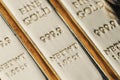 Pure 999.9 shiny fine gold bullions ingot bars, closed up macro