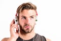 Pure sound. Modern earphones. Inspiring music concept. Man handsome unshaven hipster listening song using headphones Royalty Free Stock Photo