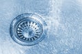 Pure water running into kitchen sink drain Royalty Free Stock Photo