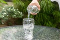 Pure water was pouring in to the transparent glass Royalty Free Stock Photo