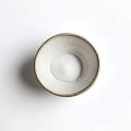 Pure White Bowl Filled with Baking Soda on Sterile Background Royalty Free Stock Photo