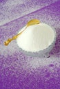 Pure White Granulated Sugar on a Magenta Background