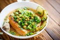 Puree soup with green peas, pickled cucumbers and croutons Royalty Free Stock Photo