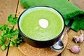 Puree from spinach with garlic on board Royalty Free Stock Photo
