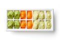 Pureed baby food in ice trays from above Royalty Free Stock Photo