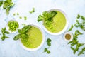 Pureed edamame soup with fresh herbs seasoning  top down view Royalty Free Stock Photo