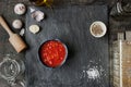 Pureed tomatoes in a ceramic dish on a table Royalty Free Stock Photo