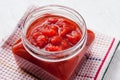 Pureed tomatoes in a glass jar Royalty Free Stock Photo