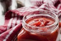 Pureed tomatoes in a glass jar Royalty Free Stock Photo