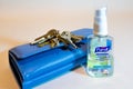 Purell Advanced Hand Sanitizer Gel with keys and purse