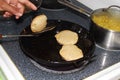 Puri indian food frying in kitchen