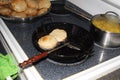 Puri indian food frying in kitchen Royalty Free Stock Photo