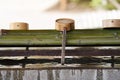 The purification fountain `Chozuya` in the Japanese shrine. Royalty Free Stock Photo